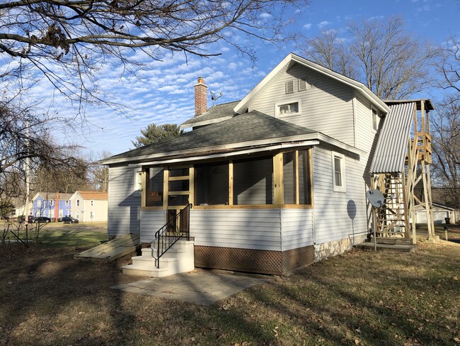 Back enclosed porch - 210 S Concord St