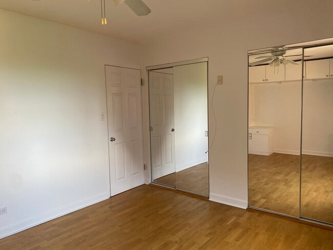 Large bedroom closet with built-in closet system - 4970 N Marine Dr