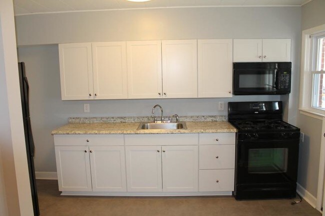 Foto del edificio - 8051 Wallace Rd
