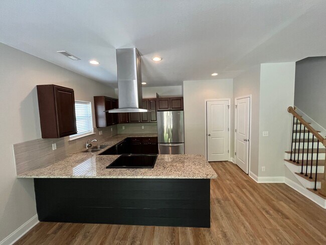 Building Photo - 4 BR | 2.5 BA | Townhome Close to Volkswagen, Amazon & Fed Ex