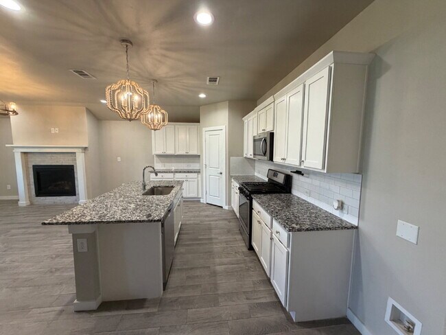 Building Photo - * MOVE IN SPECIAL * Beautiful 4 Bedroom 2 Bath Home in Wollforth!