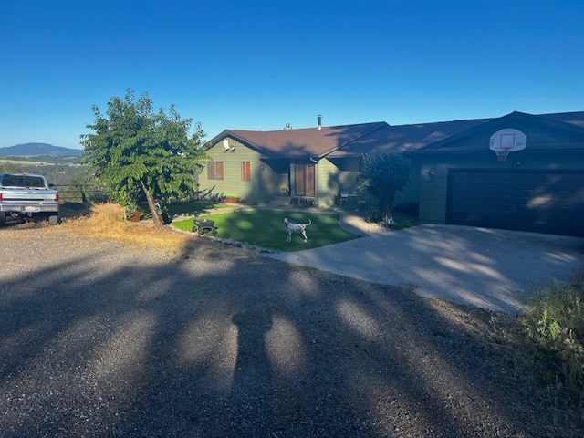 Front of house from driveway - 12505 S Center Ln