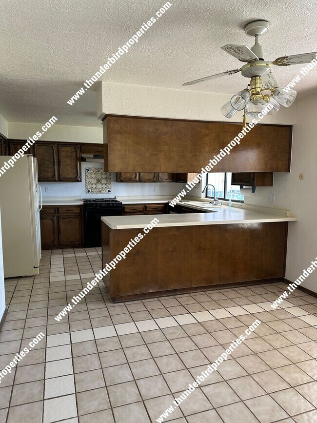 Building Photo - Great NE Heights 4 bedroom home with a pool