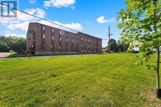 Building Photo - 6-16 John St S