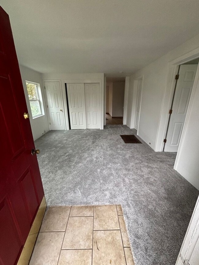 Building Photo - Half off first month's rent! Cute 2-bdrm/1-bath St. Johns duplex—Garage, shared w/d, new paint