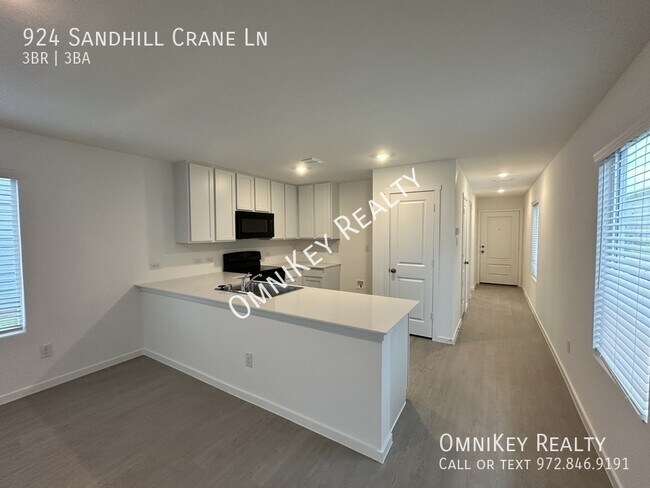 Foto del edificio - 924 Sandhill Crane Ln