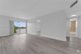 Building Photo - 8560 N Sherman Cir