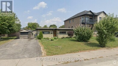 Building Photo - 7501 Homeside Gardens
