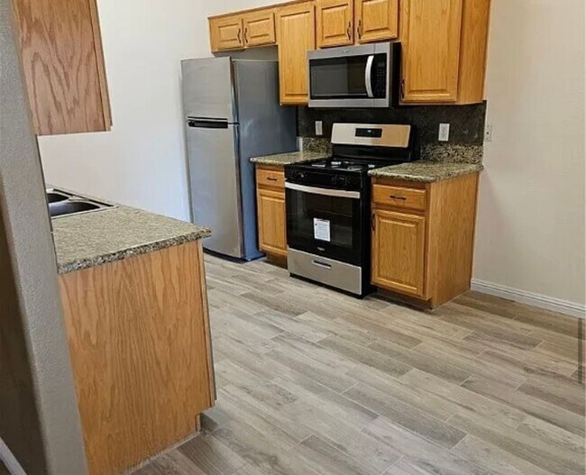 Foto del edificio - Ground floor condo in Green Valley Ranch area