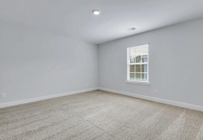 Foto del edificio - 3-bedroom, 2.5-bathroom Townhouse