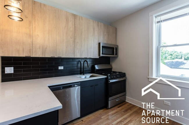 Foto del edificio - 4007 N Lowell Ave