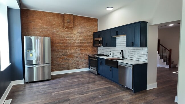 Photo - Brand-New 3BR/2BA Near Downtown & UC in OTR | Stylish Finishes, In-Unit Laundry, Gated Entry Apartment