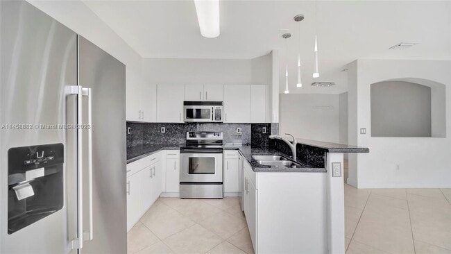 Building Photo - 10931 NW 79th St