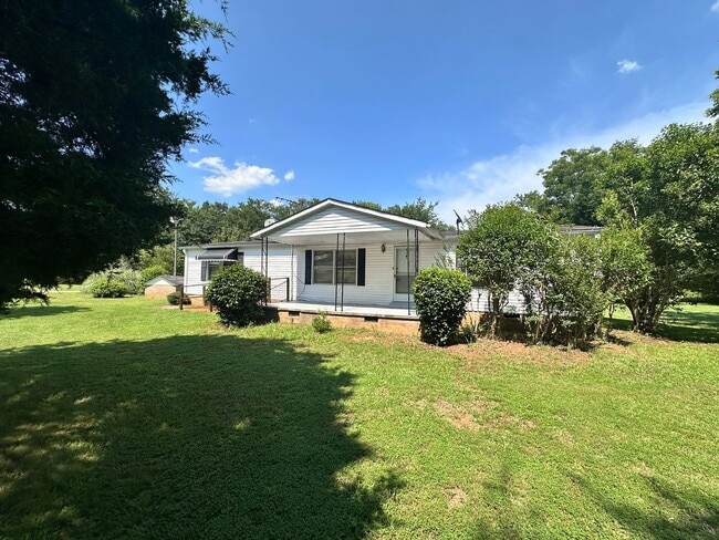 Building Photo - Exclusively Offered By Muse Realty Rentals...