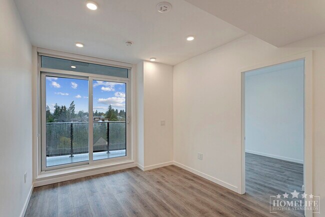 Photo du bâtiment - Bright & Modern 2-Bed, 2-Bath Condo in Sur...