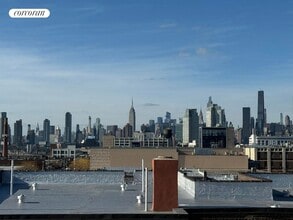 Building Photo - 47-55-55 39th Pl