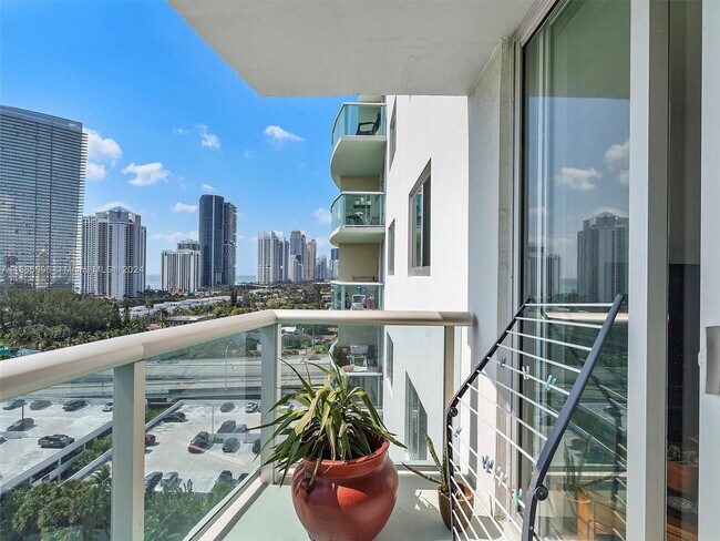 Building Photo - 19380 Collins Ave