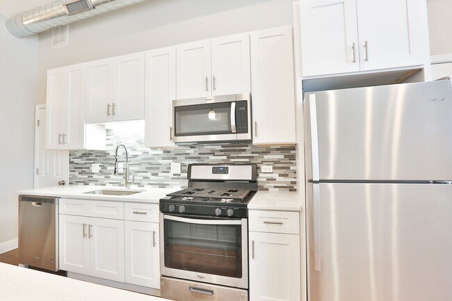 Foto del edificio - Gorgeous 2Bed/1bath in Logan Square! Condo Quality! In-Unit Laundry! Central Air! Stainless Steel!