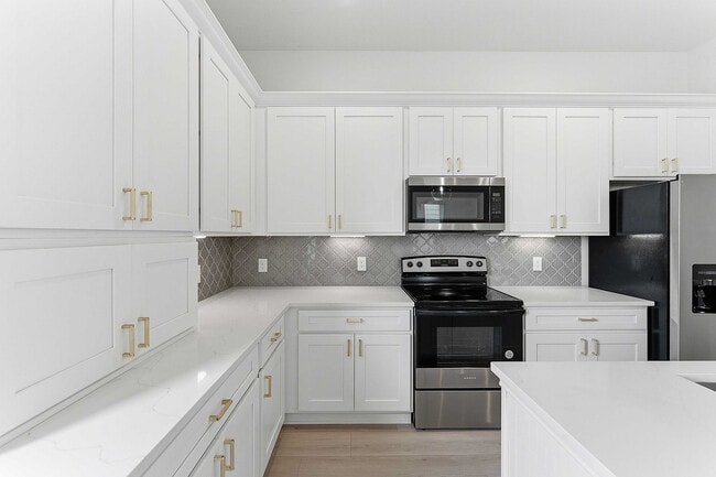 Modern Kitchen - Arbor & Stone at Morton Ranch