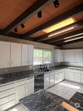 Building Photo - 6395 Rustic Hills Dr