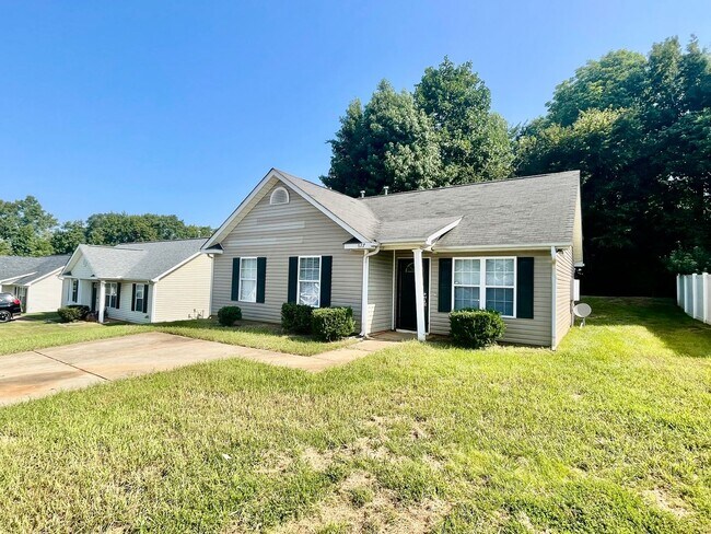 Building Photo - This lovely three bedroom two bath home