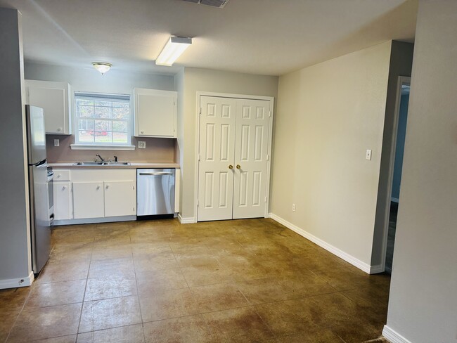 Kitchen/dining area with washroom. - 136 Peavine Rd