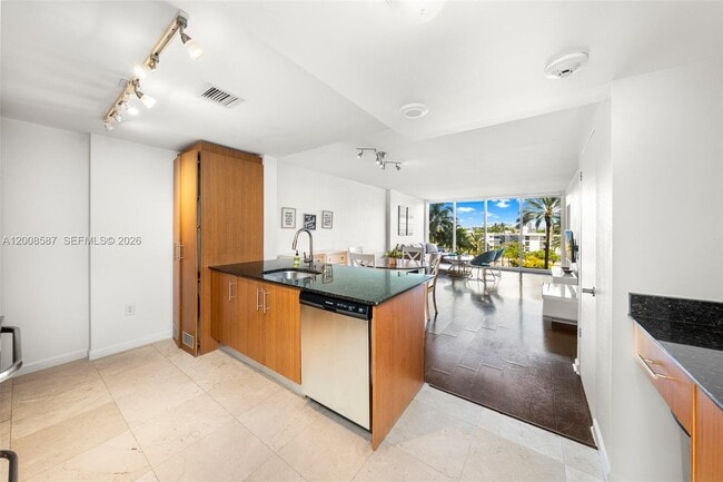Building Photo - 10275 Collins Ave