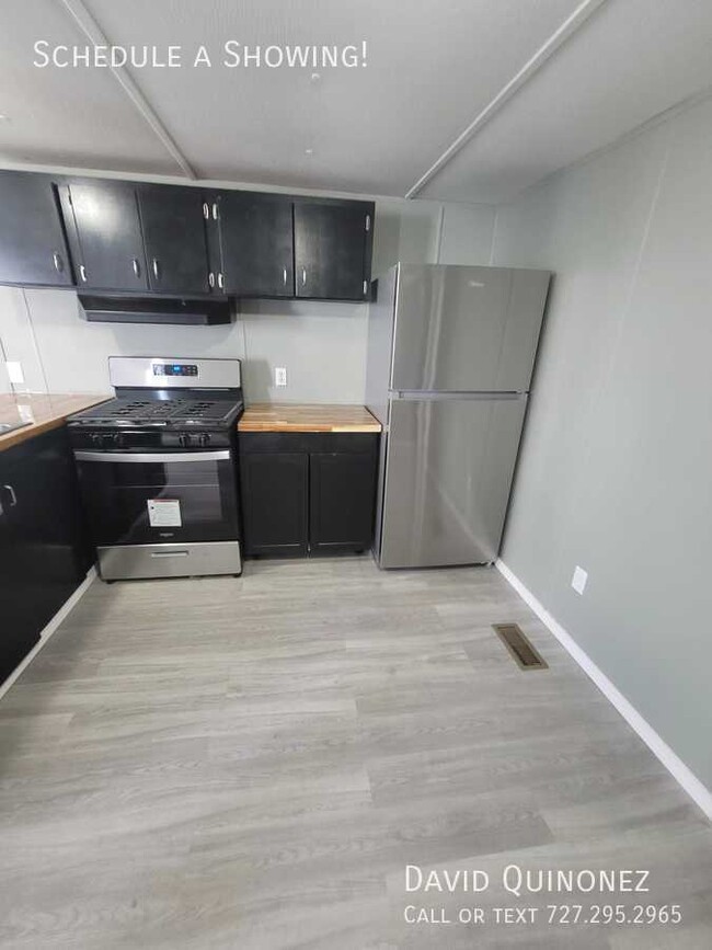 Building Photo - Sale Prices Starting at: $31,999 or Lease ...