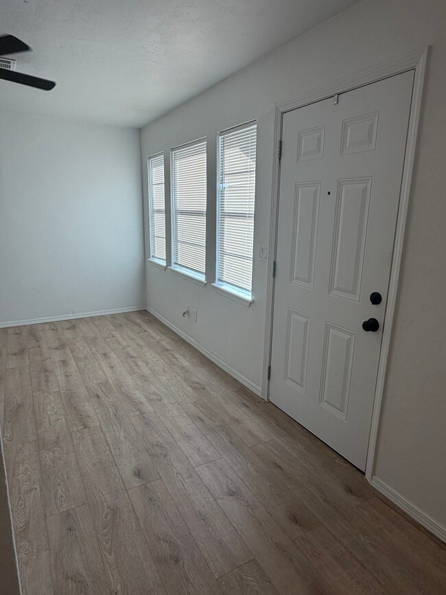 Living area with lots of natural light! - 615 S 6th St