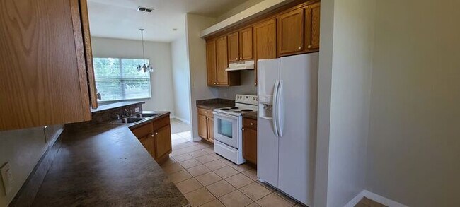 Building Photo - Single Family Home in Poinciana Tuscany Pr...