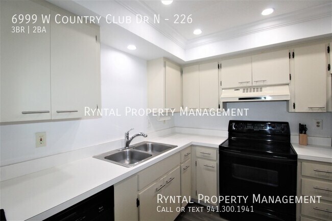 Building Photo - 6999 W Country Club Dr N