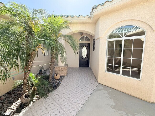 Building Photo - Spacious 4-Bedroom Home with Pool & Spa in...