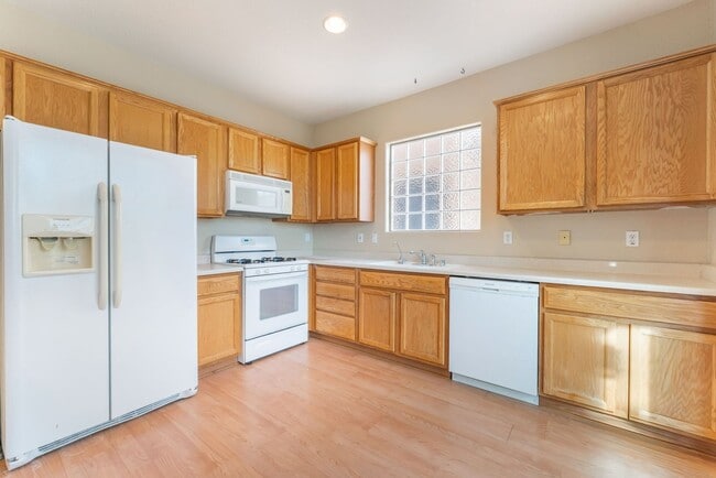 Building Photo - Bright & Open Two-Story Home with Downstairs Bedroom!