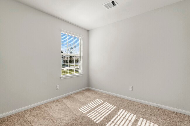Foto del edificio - 8223 Blooming Meadow Ln