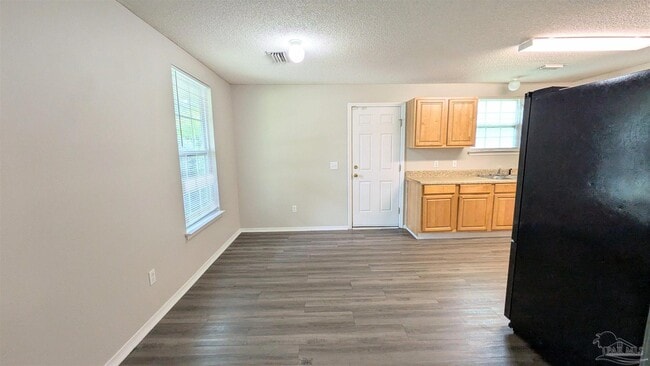 Building Photo - 8660 Figland Ave