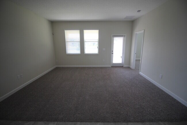 Building Photo - Newer 4/3 Home at The Oaks in Moss Park wi...