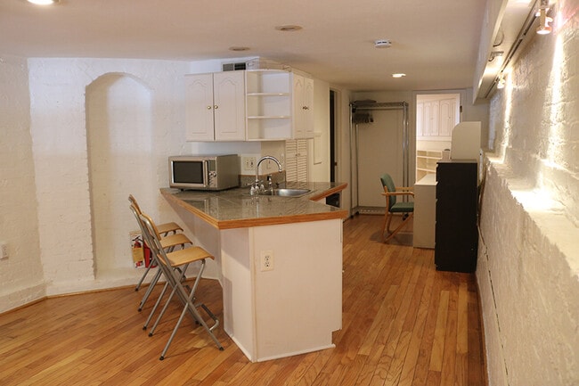 Kitchenette dining area in foreground, extra area which can be used as a study in background - 3118 1/2 Dumbarton St NW
