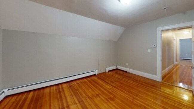 Building Photo - Renovated 6BR with In-Unit Laundry, 3 Parking Spaces & Commuter Rail Access