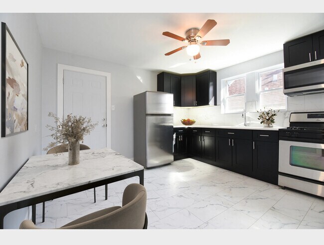 Foto del edificio - 5128 W Henderson St