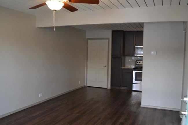 Faux Wood Flooring and Open Layout in Renovated Apts - The Heritage Apartments