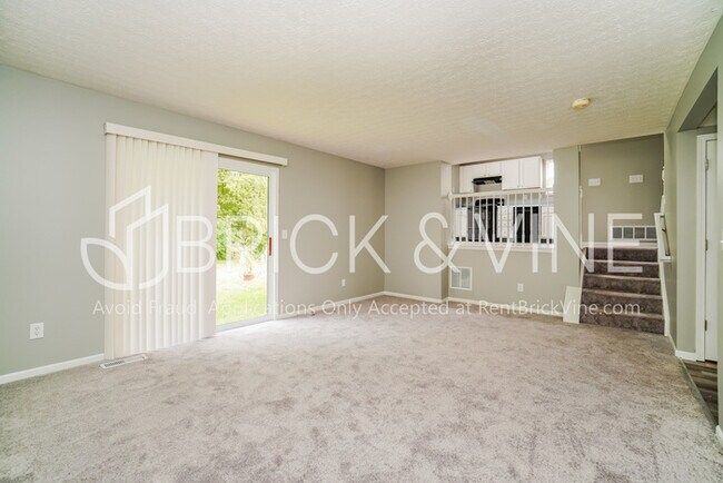 Building Photo - Two-story, pet-friendly home