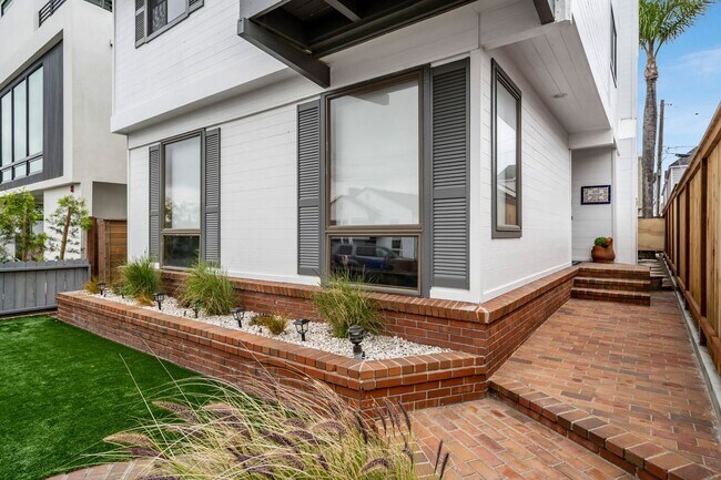 Building Photo - Modern Elegance Meets Ocean Breezes – Full...