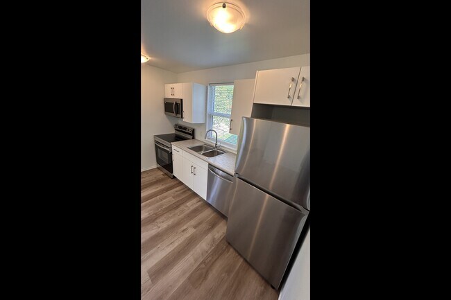Photo du bâtiment - 11936-11947 47 St NW