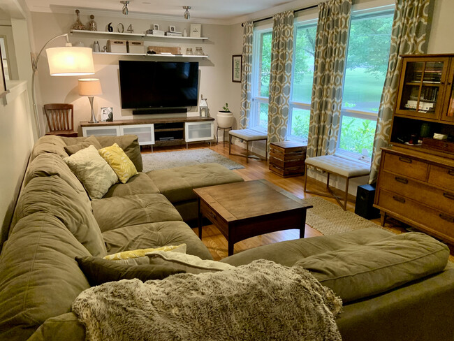 Living Room with large windows overlooking the front yard - 604 Joyce Ln