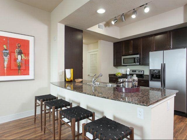 Building Photo - The Sun Shines Down on This 2 BR Apt