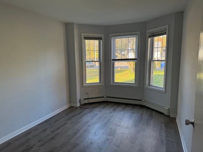 One of two bedrooms with bay window - 827 Woodward Ave
