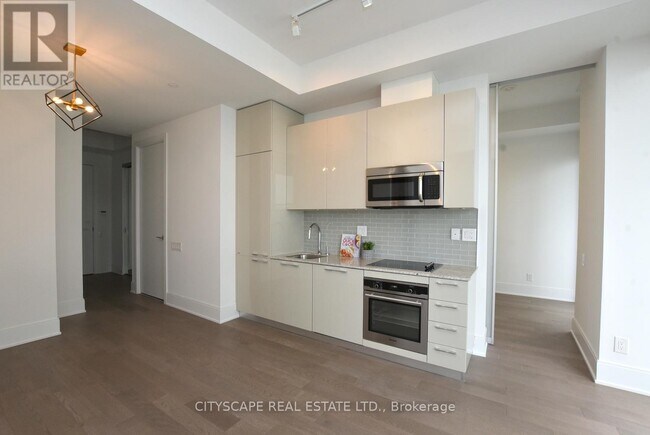 Building Photo - 50 Charles St E