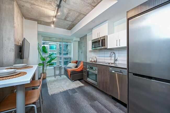 Building Photo - Studio + Den (1 bed 1 bath)