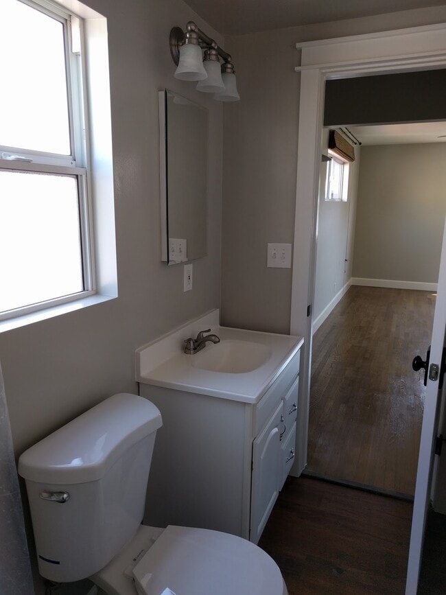 bathroom looking into primary bedroom - 8608 Harrison Way