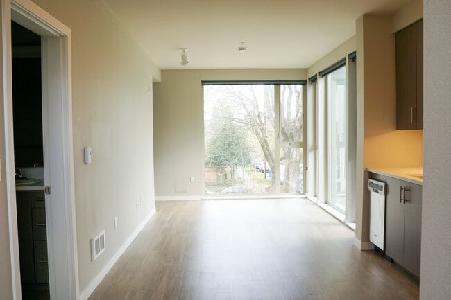 Building Photo - Corner 2nd Floor 1 Bdr w/Dishwasher, W&D, Condo Finishes!